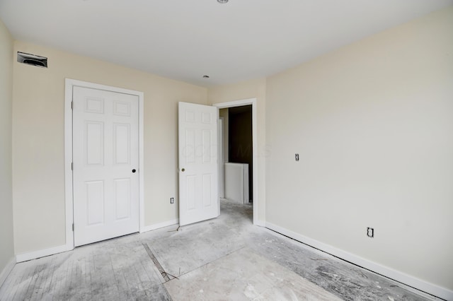 1292-1298 E 17th Ave, Columbus, OH 43211 - unfurnished bedroom featuring baseboards