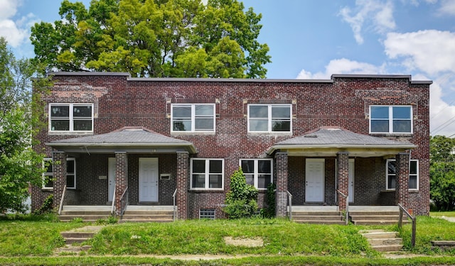 1292-1298 E 17th Ave, Columbus, OH 43211 - townhome / multi-family property featuring a porch and brick siding