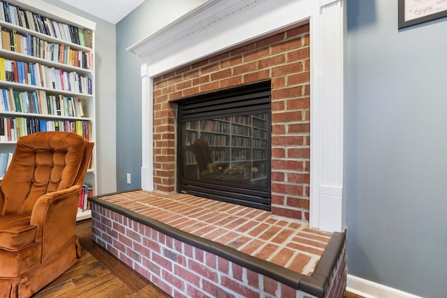 302 Streamwater Ct, Blacklick, OH 43004 - detailed view of wood finished floors, a fireplace, and baseboards