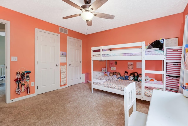 302 Streamwater Ct, Blacklick, OH 43004 - carpeted bedroom featuring a textured ceiling and a ceiling fan