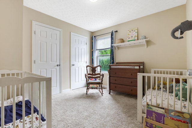 302 Streamwater Ct, Blacklick, OH 43004 - carpeted bedroom with a textured ceiling and baseboards