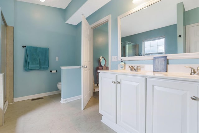 302 Streamwater Ct, Blacklick, OH 43004 - bathroom with toilet, double vanity, a shower stall, baseboards, and tile patterned flooring