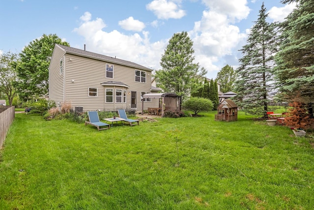 302 Streamwater Ct, Blacklick, OH 43004 - back of property featuring central AC