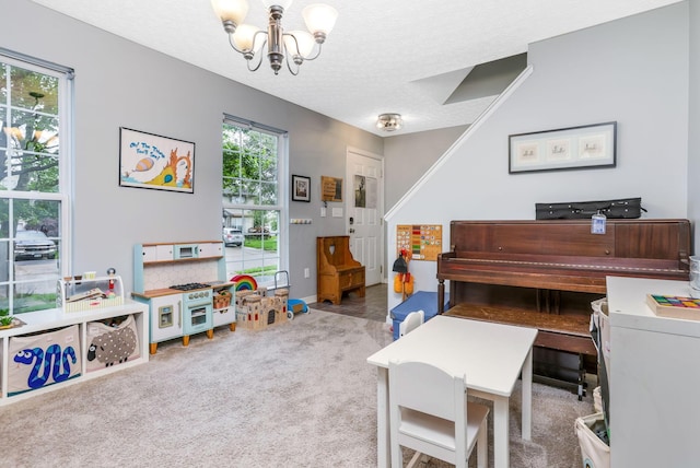 302 Streamwater Ct, Blacklick, OH 43004 - home office featuring a chandelier, a textured ceiling, baseboards, and carpet