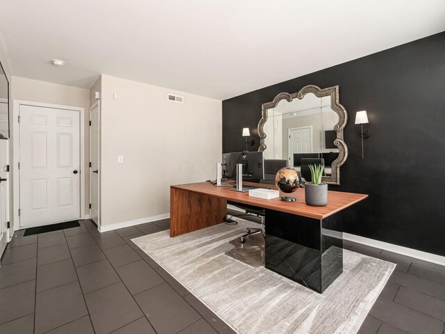 802 N 4th St Unit 802, Columbus, OH 43215 - office space with dark tile patterned floors and baseboards