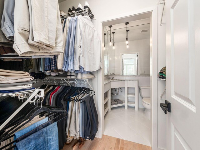 802 N 4th St Unit 802, Columbus, OH 43215 - walk in closet featuring a sink and tile patterned floors