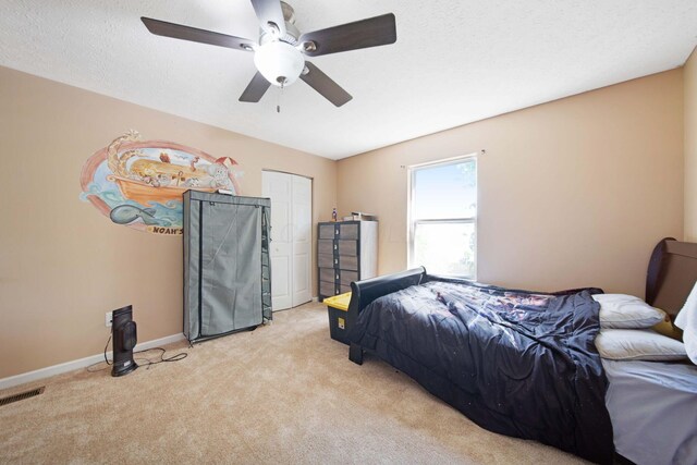 7619 Rippingale St, Blacklick, OH 43004 - bedroom with light colored carpet, baseboards, a ceiling fan, and a closet