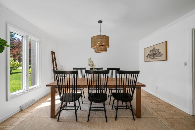 8121 Blind Brook Ct, Columbus, OH 43235 - dining area with healthy amount of natural light and ornamental molding