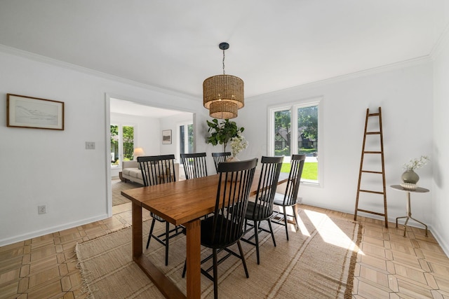 8121 Blind Brook Ct, Columbus, OH 43235 - dining space with healthy amount of natural light, crown molding, and a chandelier