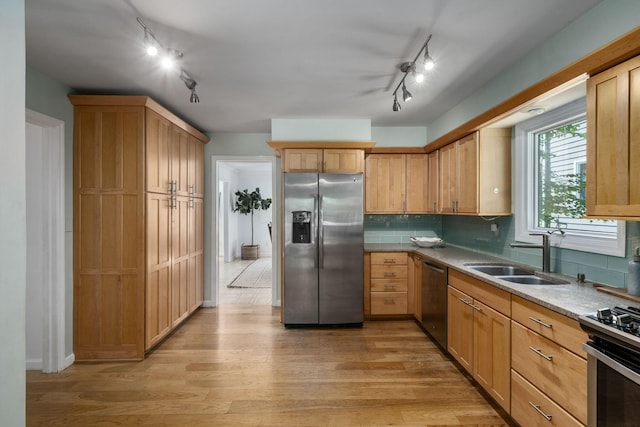 8121 Blind Brook Ct, Columbus, OH 43235 - kitchen with stainless steel appliances, rail lighting, and light wood-style floors