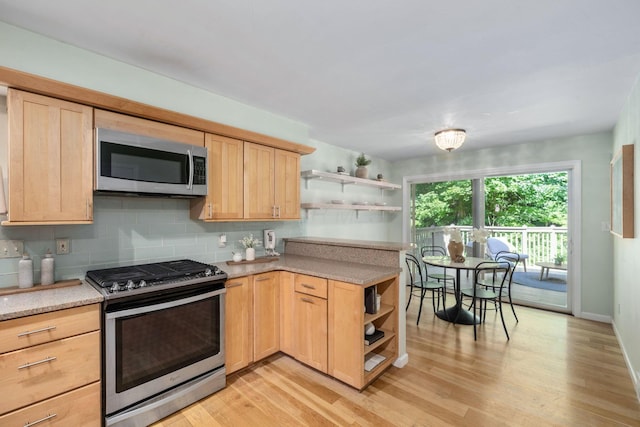 8121 Blind Brook Ct, Columbus, OH 43235 - kitchen with appliances with stainless steel finishes, open shelves, light brown cabinetry, and light wood finished floors