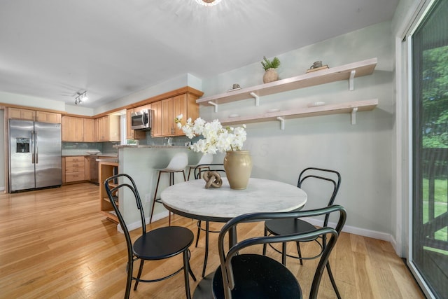 8121 Blind Brook Ct, Columbus, OH 43235 - dining area with light wood-type flooring and baseboards