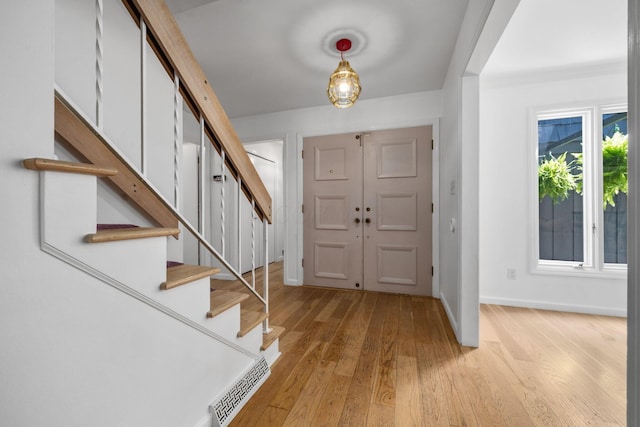 8121 Blind Brook Ct, Columbus, OH 43235 - entryway featuring stairway and light wood finished floors