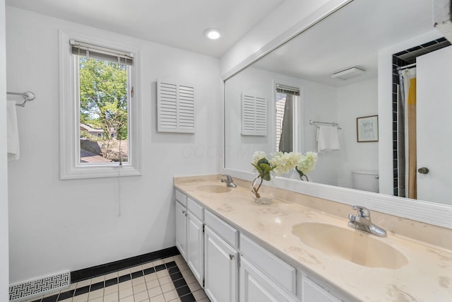 8121 Blind Brook Ct, Columbus, OH 43235 - bathroom with double vanity and tile patterned flooring