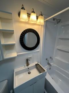 130 N 11th St, Newark, OH 43055 - full bathroom with shower / bath combination, toilet, and vanity