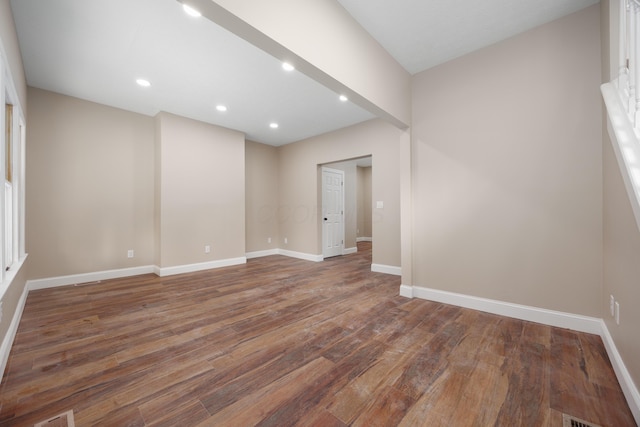 463 E Woodrow Ave, Columbus, OH 43207 - unfurnished room with wood finished floors, baseboards, and recessed lighting