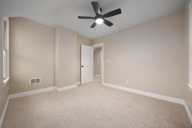 463 E Woodrow Ave, Columbus, OH 43207 - empty room featuring light carpet, baseboards, and a ceiling fan