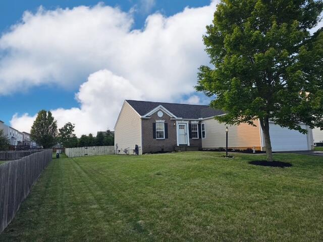 1405 Hoovler Way, Pataskala, OH 43062 - view of front facade featuring a garage