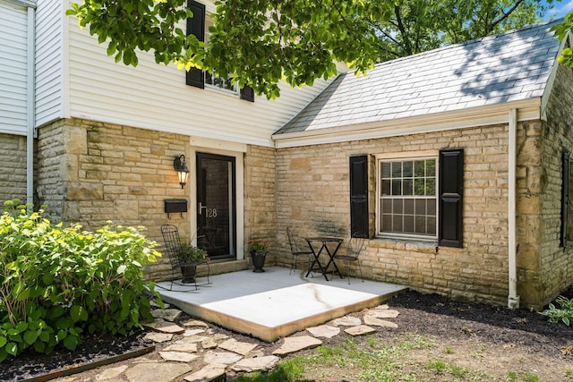 128 S Kellner Rd, Columbus, OH 43209 - doorway to property featuring stone siding