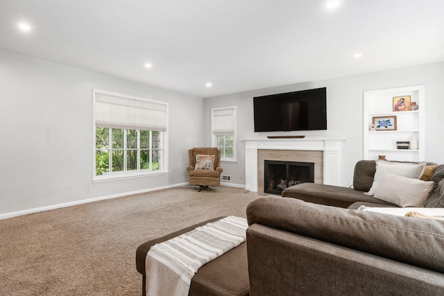 128 S Kellner Rd, Columbus, OH 43209 - living area with recessed lighting, a fireplace with flush hearth, carpet, and baseboards