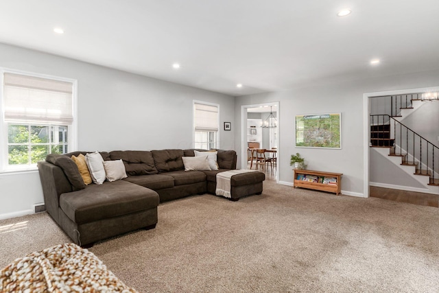 128 S Kellner Rd, Columbus, OH 43209 - carpeted living room featuring stairs, recessed lighting, baseboards, and a chandelier
