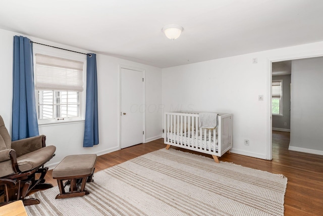 128 S Kellner Rd, Columbus, OH 43209 - bedroom featuring wood finished floors and baseboards