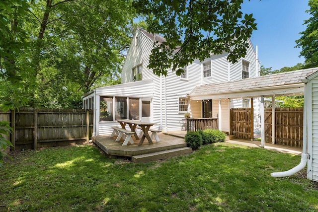 128 S Kellner Rd, Columbus, OH 43209 - back of property featuring a sunroom and a wooden deck