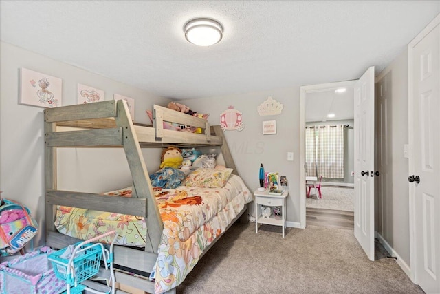5895 Swartz Mill Rd SE, Sugar Grove, OH 43155 - bedroom with carpet, a textured ceiling, and baseboards