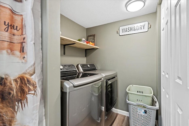 5895 Swartz Mill Rd SE, Sugar Grove, OH 43155 - laundry area featuring washer and dryer, wood finished floors, and baseboards