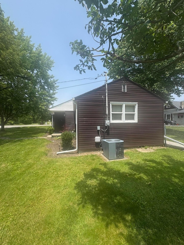 53 State St, Jeffersonville, OH 43128 - view of home's exterior featuring central AC unit