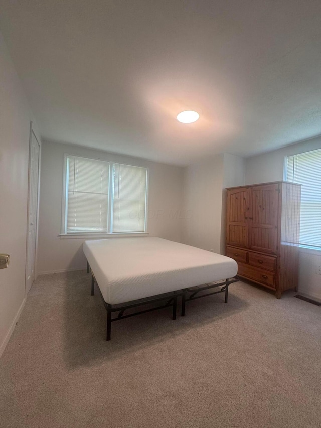 53 State St, Jeffersonville, OH 43128 - carpeted bedroom featuring baseboards