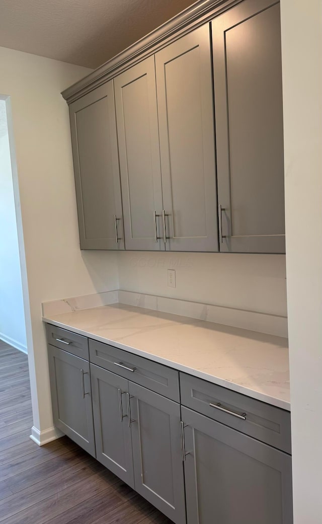3323 Tender Ave Lot 7165, Powell, OH 43065 - bar area with dark wood-style floors and baseboards