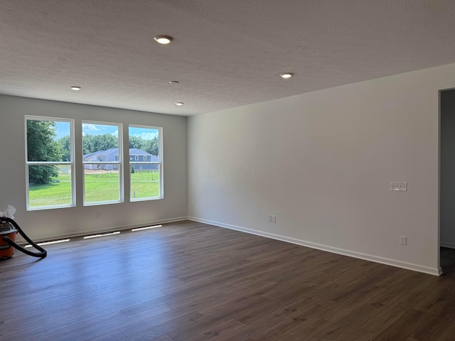 3323 Tender Ave Lot 7165, Powell, OH 43065 - empty room with a textured ceiling, dark wood finished floors, and recessed lighting