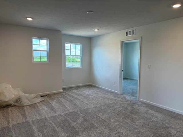 3323 Tender Ave Lot 7165, Powell, OH 43065 - unfurnished room with carpet floors, recessed lighting, and a textured ceiling