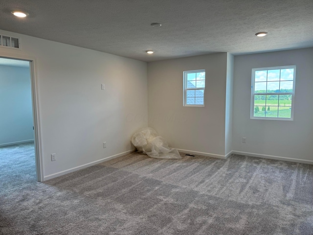 3323 Tender Ave Lot 7165, Powell, OH 43065 - spare room with carpet flooring, a textured ceiling, and recessed lighting