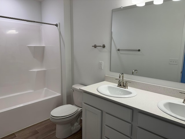 3323 Tender Ave Lot 7165, Powell, OH 43065 - bathroom featuring double vanity, wood finished floors, and tub / shower combination