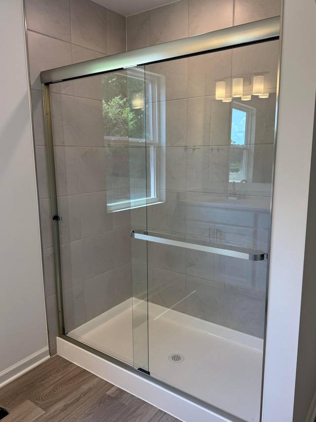 3323 Tender Ave Lot 7165, Powell, OH 43065 - bathroom featuring wood finished floors and a stall shower