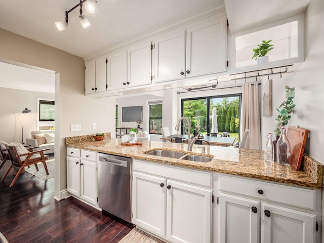 3579 Aaron Dr, Columbus, OH 43228 - kitchen featuring dishwasher, a sink, white cabinets, and light stone counters