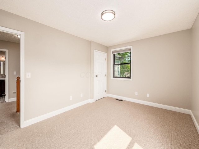 3579 Aaron Dr, Columbus, OH 43228 - empty room featuring light colored carpet and baseboards