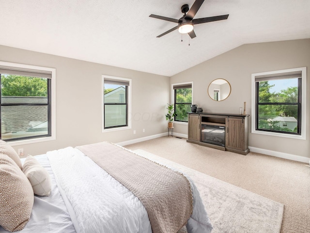 3579 Aaron Dr, Columbus, OH 43228 - bedroom featuring baseboards, light colored carpet, lofted ceiling, and a ceiling fan