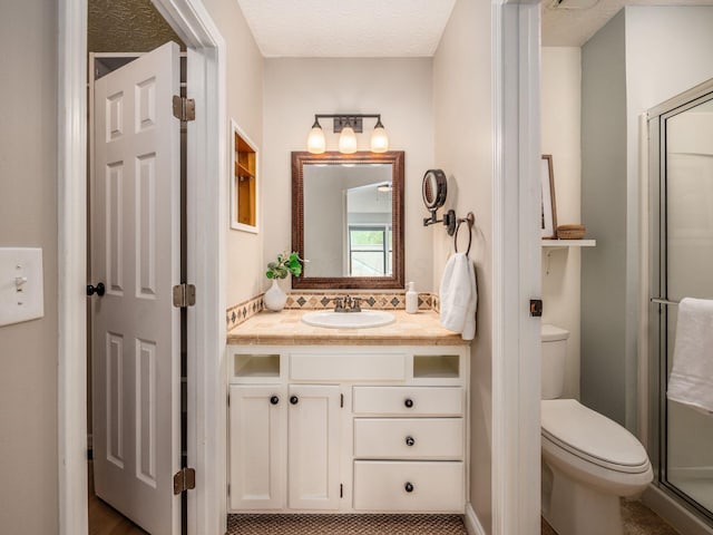 3579 Aaron Dr, Columbus, OH 43228 - full bathroom featuring a stall shower, vanity, and toilet
