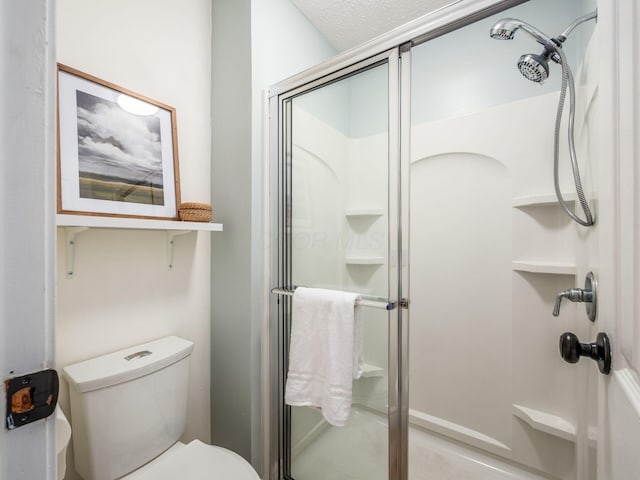 3579 Aaron Dr, Columbus, OH 43228 - bathroom featuring a stall shower and toilet