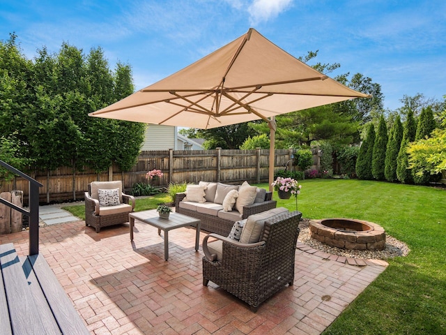 3579 Aaron Dr, Columbus, OH 43228 - view of patio / terrace featuring an outdoor living space with a fire pit
