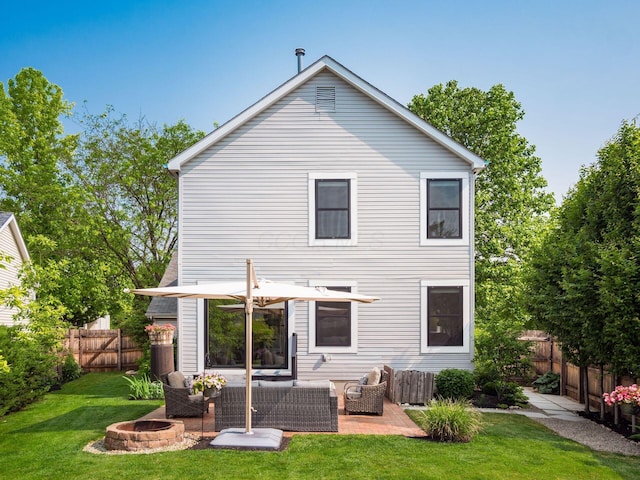 3579 Aaron Dr, Columbus, OH 43228 - back of house featuring an outdoor living space with a fire pit and a patio