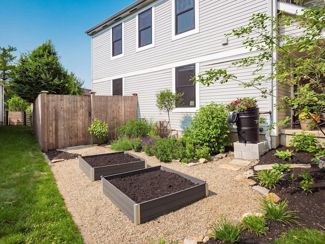 3579 Aaron Dr, Columbus, OH 43228 - rear view of house featuring a garden