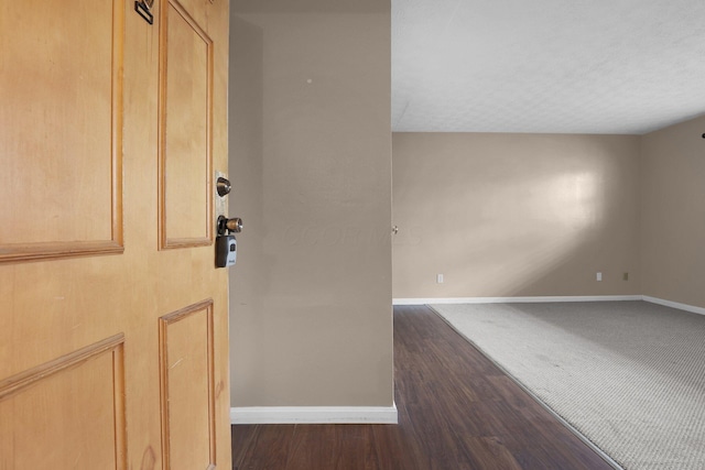 1530 Slade Ave Unit 103, Columbus, OH 43235 - entryway featuring baseboards and dark wood-style flooring