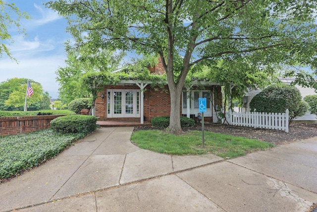 1530 Slade Ave Unit 103, Columbus, OH 43235 - obstructed view of property with french doors and brick siding