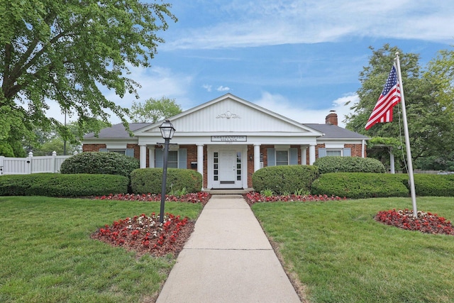 1530 Slade Ave Unit 103, Columbus, OH 43235 - neoclassical home featuring brick siding, a chimney, and covered porch