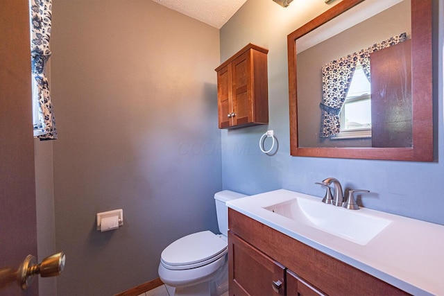5102 Avalon Ave, Columbus, OH 43229 - bathroom with vanity and a textured ceiling
