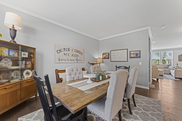 185 Saffron Dr, Sunbury, OH 43074 - dining area with wood finished floors, crown molding, and baseboards
